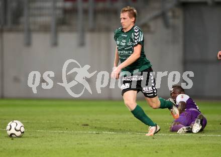 Fussball Regionalliga. SK Austria Klagenfurt gegen Feldkirchen. Thierry Fidjeu Tazemeta, (Austria), Michael Wernig  (Feldkirchen). Klagenfurt, am 21.8.2012.
Foto: Kuess
---
pressefotos, pressefotografie, kuess, qs, qspictures, sport, bild, bilder, bilddatenbank