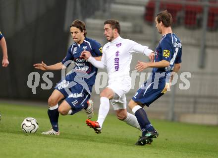 Fussball Regionalliga. SK Austria Klagenfurt gegen Kalsdorf. Grega Triplat, (Klagenfurt), Thomas Miedl, Rafael Dorn  (Kalsdorf). Klagenfurt, 3.11.2012.
Foto: Kuess
---
pressefotos, pressefotografie, kuess, qs, qspictures, sport, bild, bilder, bilddatenbank