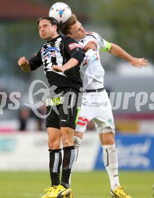 Fussball. Bundesliga.  RZ Pellets WAC gegen SK Puntigamer Sturm Graz.  Michael Sollbauer,  (WAC), Imre Szabics (Graz). Wolfsberg, 27.4.2013.
Foto: Kuess

---
pressefotos, pressefotografie, kuess, qs, qspictures, sport, bild, bilder, bilddatenbank