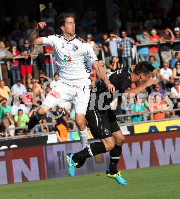 Fussball Bundesliga. RZ Pellets WAC gegen FC Wacker Innsbruck. Christian Falk,  (WAC), Marco Kofler (Innsbruck). Wolfsberg, 10.8.2013.
Foto: Kuess

---
pressefotos, pressefotografie, kuess, qs, qspictures, sport, bild, bilder, bilddatenbank