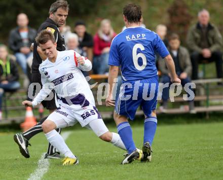 Fussball Unterliga Ost. SG SAK Amateure gegen Ruden. Dorian Urank, (SAK),  Robert Sadnek-Perchtold (Ruden). Wiederndorf, am 6.10.2013.
Foto: Kuess
---
pressefotos, pressefotografie, kuess, qs, qspictures, sport, bild, bilder, bilddatenbank