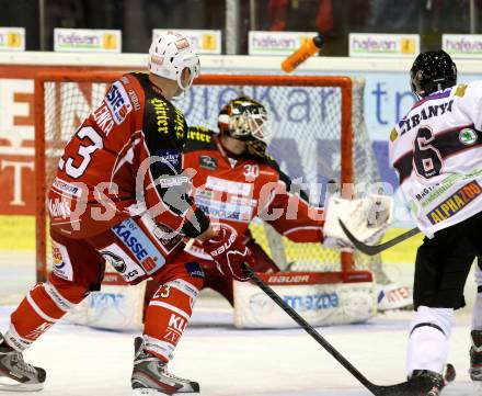 EBEL. Eishockey Bundesliga. KAC gegen SAPA Fehervar AV19. Mike Siklenka, Rene Swette, (KAC), Bence Sziranyi  (Alba Volan). Klagenfurt, am 8.10.2013
Foto: Kuess 

---
pressefotos, pressefotografie, kuess, qs, qspictures, sport, bild, bilder, bilddatenbank
