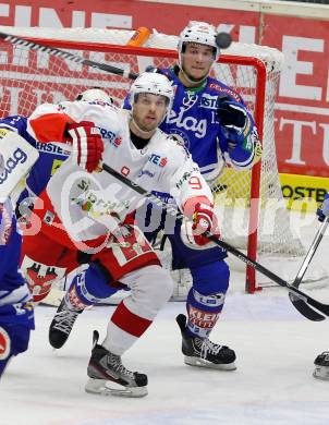 EBEL. Eishockey Bundesliga. EC VSV gegen HCB Suedtirol.  Stefan Bacher, (VSV), Rick Schofield (Bozen). Villach, am 11.10..2013.
Foto: Kuess 


---
pressefotos, pressefotografie, kuess, qs, qspictures, sport, bild, bilder, bilddatenbank