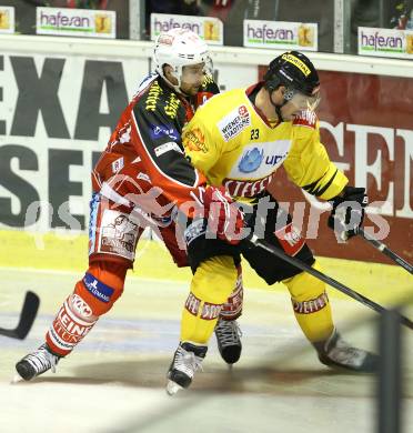 EBEL. Eishockey Bundesliga. KAC gegen Vienna Capitals. Johannes Reichel(KAC), Markus Schlacher (Caps). Klagenfurt, am 15.10.2013.
Foto: Kuess
---
pressefotos, pressefotografie, kuess, qs, qspictures, sport, bild, bilder, bilddatenbank