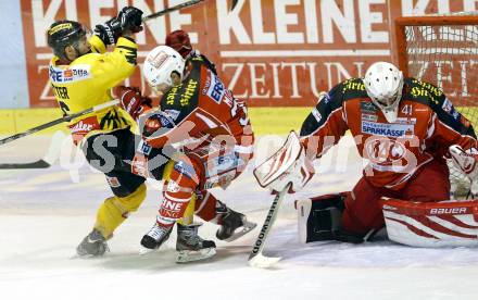 EBEL. Eishockey Bundesliga. KAC gegen UPC Vienna Capitals. Markus Mueller, Wolf Imrich,  (KAC), Rafael Rotter (Caps). Klagenfurt, am 15.10.2013
Foto: Kuess 

---
pressefotos, pressefotografie, kuess, qs, qspictures, sport, bild, bilder, bilddatenbank