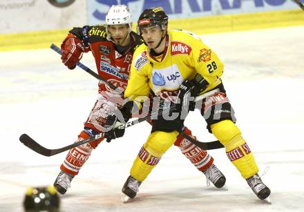 EBEL. Eishockey Bundesliga. KAC gegen Vienna Capitals. Thomas Koch (KAC), Mike Ouellette (Caps). Klagenfurt, am 15.10.2013.
Foto: Kuess
---
pressefotos, pressefotografie, kuess, qs, qspictures, sport, bild, bilder, bilddatenbank