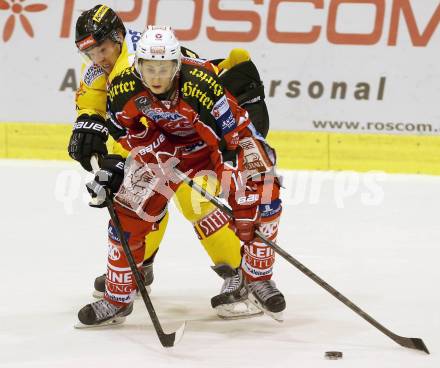 EBEL. Eishockey Bundesliga. KAC gegen UPC Vienna Capitals. Daniel Ban, (KAC), Marcus Olsson  (Caps). Klagenfurt, am 15.10.2013
Foto: Kuess 

---
pressefotos, pressefotografie, kuess, qs, qspictures, sport, bild, bilder, bilddatenbank