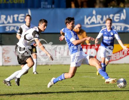 Fussball. Kaerntner Liga. Treibach gegen Spittal/Drau. Sebastian Hertelt (Treibach), Rafael Graf (Spittal). Treibach, 26.10.2013.
Foto: Kuess
---
pressefotos, pressefotografie, kuess, qs, qspictures, sport, bild, bilder, bilddatenbank