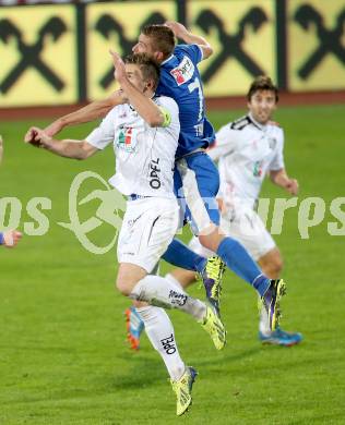 Fussball Bundesliga. RZ Pellets WAC gegen SV Scholz Groedig. Michael Sollbauer, (WAC), Tadej Trdina (Groedig). Wolfsberg, 2.11.2013.
Foto: Kuess

---
pressefotos, pressefotografie, kuess, qs, qspictures, sport, bild, bilder, bilddatenbank