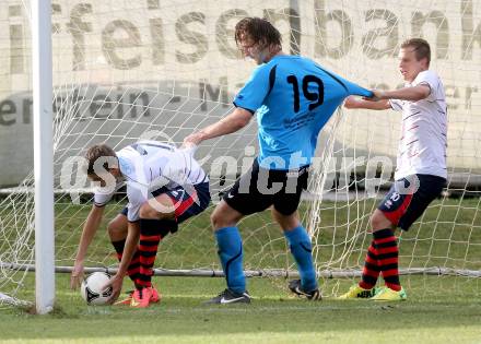 Fussball. Unterliga Ost. SG Magdalensberg/Eberndorfer AC gegen SPG FC Poggersdorf KM. Florian Bidovec, (Magdalensberg), Fabian Krenn, Ingo Pucher  (Poggersdorf). Pischeldorf, am 26.7.2014.
Foto: Kuess
---
pressefotos, pressefotografie, kuess, qs, qspictures, sport, bild, bilder, bilddatenbank