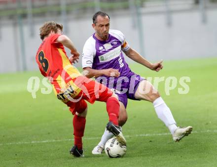 Fussball Regionalliga. Austria Klagenfurt gegen ATSV Wolfsberg. Christian Prawda (Austria Klagenfurt), Mathias Berchtold (ATSV). Wolfsberg, 8.8.2014.
Foto: Kuess
---
pressefotos, pressefotografie, kuess, qs, qspictures, sport, bild, bilder, bilddatenbank