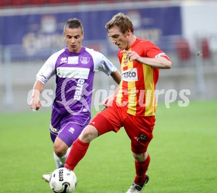 Fussball Regionalliga. Austria Klagenfurt gegen ATSV Wolfsberg. Vedran Vinko (Austria Klagenfurt), Mathias Berchtold (ATSV). Wolfsberg, 8.8.2014.
Foto: Kuess
---
pressefotos, pressefotografie, kuess, qs, qspictures, sport, bild, bilder, bilddatenbank
