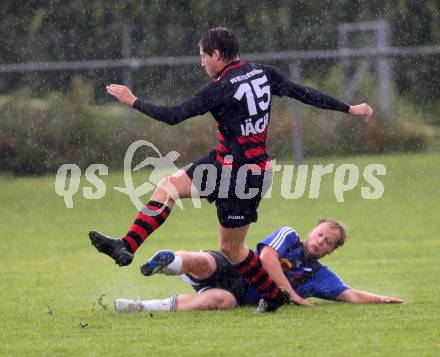 Fussball 2. KLasse D. Tainach gegen St. Paul. Alen NIkola Rajkovic, (Tainach), Rene Grassler  (St. Paul). Tainach, am 23.8.2014.
Foto: Kuess
---
pressefotos, pressefotografie, kuess, qs, qspictures, sport, bild, bilder, bilddatenbank