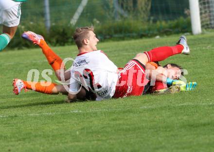 Fussball Unterliga Ost. Ludmannsdorf gegen Mittlern. Michael Krainer,  (Ludmannsdorf), Primoz Kanduc (Mittlern). Ludmannsdorf, am 31.8.2014. 
Foto: Kuess
---
pressefotos, pressefotografie, kuess, qs, qspictures, sport, bild, bilder, bilddatenbank