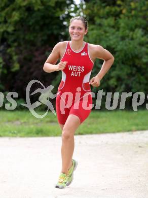 Woerthersee Triathlon.  Beatrice Weiss. Krumpendorf, am 31.8.2014.
Foto: Kuess
---
pressefotos, pressefotografie, kuess, qs, qspictures, sport, bild, bilder, bilddatenbank