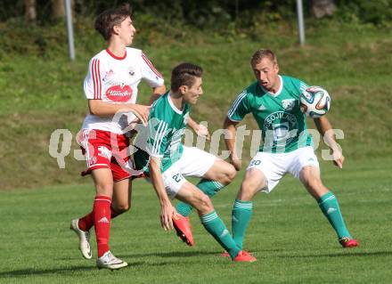 Fussball Unterliga Ost. Ludmannsdorf gegen Mittlern. Markus Partl, (Ludmannsdorf), Marcel Hober, Daniel Schuschou (Mittlern). Ludmannsdorf, am 31.8.2014. 
Foto: Kuess
---
pressefotos, pressefotografie, kuess, qs, qspictures, sport, bild, bilder, bilddatenbank