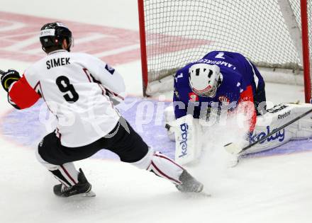 Eishockey. Champions Hockey League VSV gegen Geneve-Servette. Jean Philippe Lamoureux #1,  (VSV), Juraj Simek #9 (Geneve-Servette). Villach, 23.9.2014.
Foto: Kuess 
---
pressefotos, pressefotografie, kuess, qs, qspictures, sport, bild, bilder, bilddatenbank