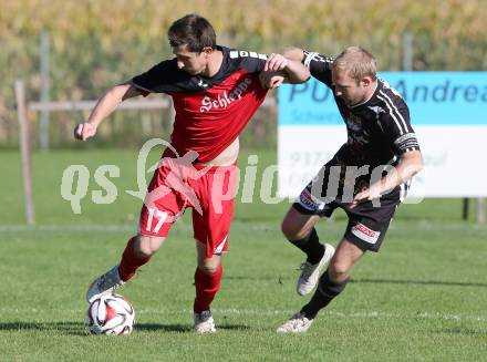 Fussball Unterliga Ost. Woelfnitz gegen Kraig. Karl Schweighofer, (Woelfnitz), Raphael Groinig  (Kraig). Woelfnitz, am 27.9.2014.
Foto: Kuess
---
pressefotos, pressefotografie, kuess, qs, qspictures, sport, bild, bilder, bilddatenbank