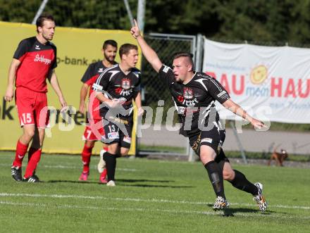 Fussball Unterliga Ost. Woelfnitz gegen Kraig. Torjubel Marco Messner  (Kraig). Woelfnitz, am 27.9.2014.
Foto: Kuess
---
pressefotos, pressefotografie, kuess, qs, qspictures, sport, bild, bilder, bilddatenbank