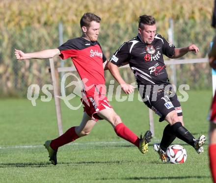 Fussball Unterliga Ost. Woelfnitz gegen Kraig. Patrick Leczek, (Woelfnitz),  Marco Messner (Kraig). Woelfnitz, am 27.9.2014.
Foto: Kuess
---
pressefotos, pressefotografie, kuess, qs, qspictures, sport, bild, bilder, bilddatenbank