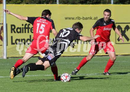 Fussball Unterliga Ost. Woelfnitz gegen Kraig. Patrick Leczek, Guido Lambacher, (Woelfnitz), Michael Salbrechter  (Kraig). Woelfnitz, am 27.9.2014.
Foto: Kuess
---
pressefotos, pressefotografie, kuess, qs, qspictures, sport, bild, bilder, bilddatenbank