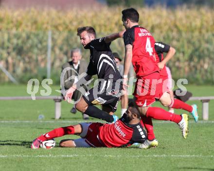 Fussball Unterliga Ost. Woelfnitz gegen Kraig. Denis Sahitaj, Mark Schweighofer, (Woelfnitz), Manuel Riesser  (Kraig). Woelfnitz, am 27.9.2014.
Foto: Kuess
---
pressefotos, pressefotografie, kuess, qs, qspictures, sport, bild, bilder, bilddatenbank