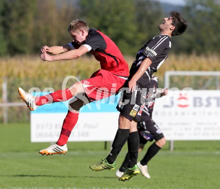 Fussball Unterliga Ost. Woelfnitz gegen Kraig. Daniel Zlattinger,  (Woelfnitz),  Christian Groinig (Kraig). Woelfnitz, am 27.9.2014.
Foto: Kuess
---
pressefotos, pressefotografie, kuess, qs, qspictures, sport, bild, bilder, bilddatenbank