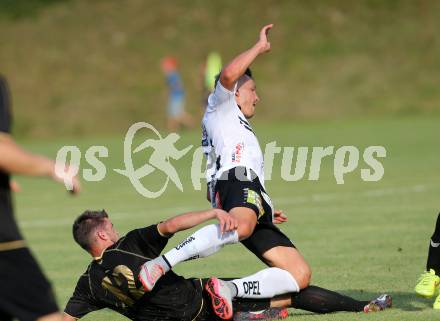 Fussball OEFB Cup. ASKOE Koettmannsdorf gegen RZ Pellets WAC.  Daniel Globotschnig,  (Koettmannsdorf), Christopher Wernitznig (WAC). Koettmannsdorf, am 19.7.2015.
Foto: Kuess
---
pressefotos, pressefotografie, kuess, qs, qspictures, sport, bild, bilder, bilddatenbank