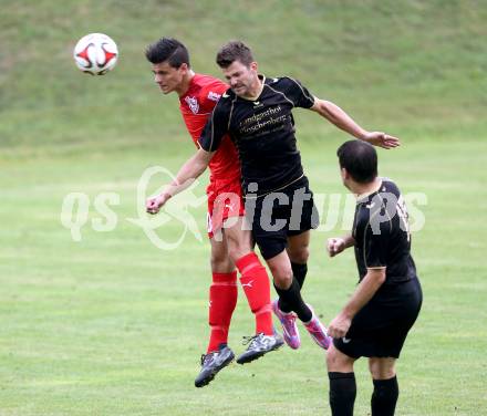 Fussball. Kaerntner Liga. Koettmannsdorf gegen Atus Ferlach. Daniel Globotschnig (Koettmannsdorf), Lukas Jaklitsch (Atus Ferlach). Koettmannsdorf, 15.8.2015.
Foto: Kuess
---
pressefotos, pressefotografie, kuess, qs, qspictures, sport, bild, bilder, bilddatenbank
