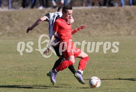 Fussball Kaerntner Liga. ATUS Ferlach gegen Maria Saal. Dominik Mak, (Ferlach), Dalibor Stojanovic  (Maria Saal). Ferlach, am 19.3.2016.
Foto: Kuess
---
pressefotos, pressefotografie, kuess, qs, qspictures, sport, bild, bilder, bilddatenbank