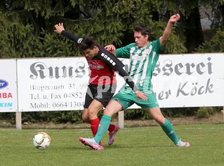 Fussball Unterliga West. Nussdorf gegen Radenthein. Aldamir Araujo Da Silva Filho, (Nussdorf), Stefan Rauter  (Radenthein). Nussdorf Debant, am 2.4.2016.
Foto: Kuess
---
pressefotos, pressefotografie, kuess, qs, qspictures, sport, bild, bilder, bilddatenbank