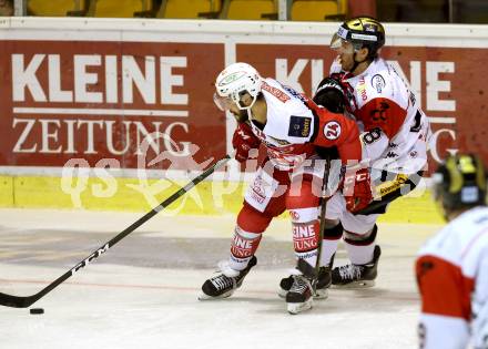 EBEL. Eishockey Bundesliga.  KAC gegen HC Orli Znojmo. Steven Strong, (KAC), Adam Hughesman (Znojmo). Klagenfurt, am 23.9.2016.
Foto: Kuess 
---
pressefotos, pressefotografie, kuess, qs, qspictures, sport, bild, bilder, bilddatenbank