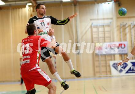 Handball HLA. SC Ferlach gegen HC Hard. Nemanja Malovic,  (Ferlach), Marko Tanaskovic (Hard). Ferlach, am 27.9.2016.
Foto: Kuess
---
pressefotos, pressefotografie, kuess, qs, qspictures, sport, bild, bilder, bilddatenbank