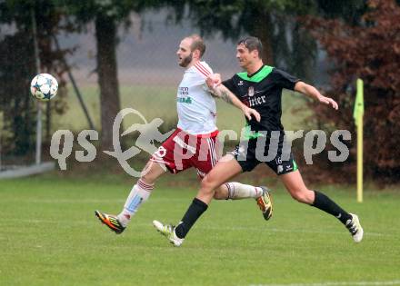 Fussball Unterliga Ost. St. Michael/Bleiburg gegen Kraig. Ales Paradiz, (St. Michael), Sebastian Hertelt  (Kraig). St. Michael ob Bleiburg, am 6.11.2016.
Foto: Kuess
---
pressefotos, pressefotografie, kuess, qs, qspictures, sport, bild, bilder, bilddatenbank