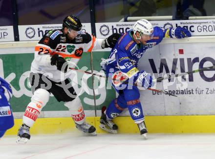 EBEL. Eishockey Bundesliga. VSV gegen	Moser Medical Graz99ers. Evan McGrath,  (VSV), Thomas Poeck (Graz). Villach, am 4.12.2016.
Foto: Kuess

---
pressefotos, pressefotografie, kuess, qs, qspictures, sport, bild, bilder, bilddatenbank
