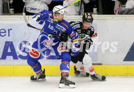 EBEL. Eishockey Bundesliga. VSV gegen	Moser Medical Graz99ers. Eric HUnter, (VSV),  Zintis Nauris Zusevics (Graz). Villach, am 4.12.2016.
Foto: Kuess

---
pressefotos, pressefotografie, kuess, qs, qspictures, sport, bild, bilder, bilddatenbank