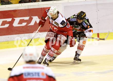EBEL. Eishockey Bundesliga. KAC gegen 	Moser Medical Graz99ers. Marco Richter,  (KAC), Mario Petrovitz (Graz). Klagenfurt, am 6.1.2017.
Foto: Kuess

---
pressefotos, pressefotografie, kuess, qs, qspictures, sport, bild, bilder, bilddatenbank
