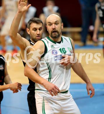 Basketball 2. Bundesliga. GD 12. Runde. KOS Celovec gegen Mattersburg Rocks. Vjeran Soldo (KOS Celovec), Ramiz Suljanovic (Mattersburg). Klagenfurt, am 8.1.2017.
Foto: Kuess
---
pressefotos, pressefotografie, kuess, qs, qspictures, sport, bild, bilder, bilddatenbank