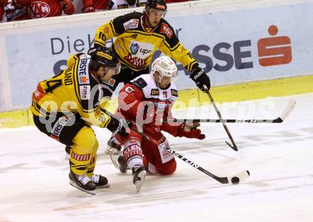 EBEL. Eishockey Bundesliga. KAC gegen 	UPC Vienna Capitals. Thomas Hundertpfund,  (KAC), Jonathan Ferland, Collin Bowman (Vienna Capitals). Klagenfurt, am 11.1.2017.
Foto: Kuess

---
pressefotos, pressefotografie, kuess, qs, qspictures, sport, bild, bilder, bilddatenbank
