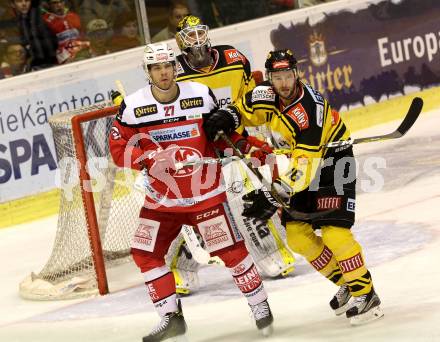 EBEL. Eishockey Bundesliga. KAC gegen 	UPC Vienna Capitals. Thomas Hundertpfund,  (KAC), Macgregor Sharp (Vienna Capitals). Klagenfurt, am 11.1.2017.
Foto: Kuess

---
pressefotos, pressefotografie, kuess, qs, qspictures, sport, bild, bilder, bilddatenbank