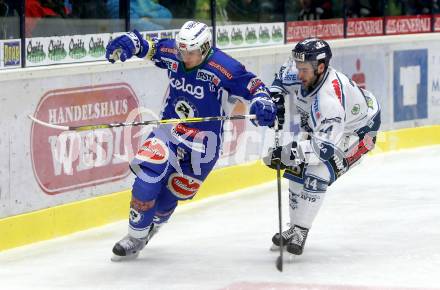 EBEL. Eishockey Bundesliga. VSV gegen	Fehervar AV 19. Daniel Nageler,  (VSV), Chris Owens (Alba Volan). Villach, am 13.1.2017.
Foto: Kuess

---
pressefotos, pressefotografie, kuess, qs, qspictures, sport, bild, bilder, bilddatenbank