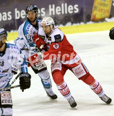 EBEL. Eishockey Bundesliga. KAC gegen 	EHC Liwest Black Wings Linz. Ziga Pance,  (KAC), Marc Andre Dorion (Linz). Klagenfurt, am 22.1.2017.
Foto: Kuess

---
pressefotos, pressefotografie, kuess, qs, qspictures, sport, bild, bilder, bilddatenbank