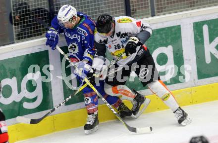 EBEL. Eishockey Bundesliga. VSV gegen	Dornbirner Eishockey Club. Erik Hunter,  (VSV), James Livingston (Dornbirn). Villach, am 27.1.2017.
Foto: Kuess

---
pressefotos, pressefotografie, kuess, qs, qspictures, sport, bild, bilder, bilddatenbank