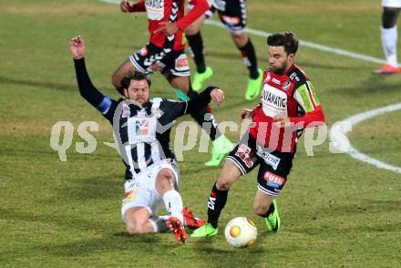 Fussball Bundesliga. RZ Pellets WAC gegen SV Guntamatic Ried.  Nemanja Rnic,  (WAC), Dieter Elsneg (Ried). Wolfsberg, am 11.2.2017.
Foto: Kuess

---
pressefotos, pressefotografie, kuess, qs, qspictures, sport, bild, bilder, bilddatenbank