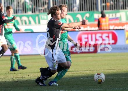 Fussball Bundesliga. RZ Pellets WAC gegen SK Rapid Wien. Peter Tschernegg, (WAC), Christopher Dibon (Rapid). Wolfsberg, am 11.2.2017.
Foto: Kuess

---
pressefotos, pressefotografie, kuess, qs, qspictures, sport, bild, bilder, bilddatenbank