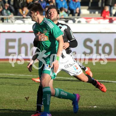 Fussball Bundesliga. RZ Pellets WAC gegen SK Rapid Wien. Nemanja Rnic,  (WAC), Giorgi Kvilitaia (Rapid). Wolfsberg, am 11.2.2017.
Foto: Kuess

---
pressefotos, pressefotografie, kuess, qs, qspictures, sport, bild, bilder, bilddatenbank