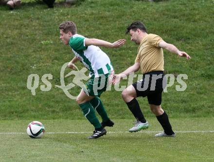 Fussball. Kaerntner Liga. Koettmannsdorf gegen Lienz. Christian Sablatnig (Koettmannsdorf), 	Mario Kleinlercher (Lienz). Koettmannsdorf, 26.3.2017.
Foto: Kuess
---
pressefotos, pressefotografie, kuess, qs, qspictures, sport, bild, bilder, bilddatenbank