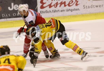 EBEL. Eishockey Bundesliga. KAC gegen 	UPC Vienna Capitals. Jamie Lundmark  (KAC),  MacGregor Sharp (Vienna Capitals). Klagenfurt, am 2.4.2017.
Foto: Kuess

---
pressefotos, pressefotografie, kuess, qs, qspictures, sport, bild, bilder, bilddatenbank
