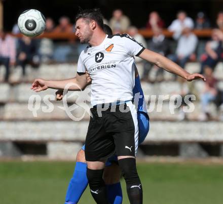 Fussball. Kaerntner Liga. Eberstein gegen ASV. Elias Nicolas Hant (Eberstein),  Oliver Pusztai (ASV). Eberstein, 8.4.2017.
Foto: Kuess
---
pressefotos, pressefotografie, kuess, qs, qspictures, sport, bild, bilder, bilddatenbank