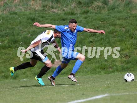 Fussball. Kaerntner Liga. Eberstein gegen ASV. Elias Nicolas Hant (Eberstein),  Niko Maric (ASV). Eberstein, 8.4.2017.
Foto: Kuess
---
pressefotos, pressefotografie, kuess, qs, qspictures, sport, bild, bilder, bilddatenbank